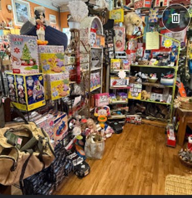 Colorful merchandise displays along an aisle inside The Department Store